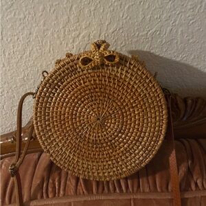 Cute wicker purse with bow design clasp